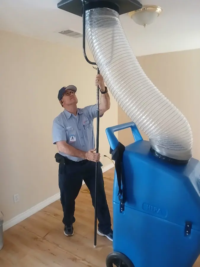 Mini Split Installation technician using HEPA equipment in Saginaw